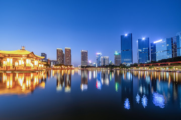 Naklejka premium Night skyline of CBD building in Nanhai District, Foshan City, Guangdong Province, China