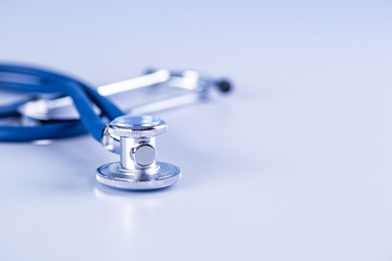 Medical concept image. Stethoscope on white background close up.A lot copy space around the product.Blue stethoscope.Healthcare.