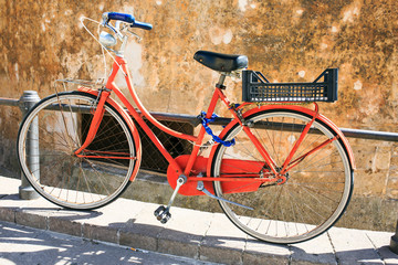 Fototapeta na wymiar Vintage bicycle parked in the street