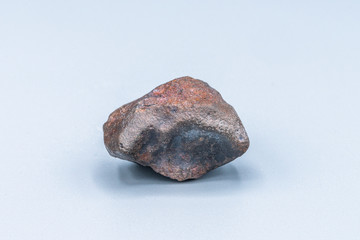 Chondrite Meteorite L Type isolated, piece of rock formed in outer space in the early stages of Solar System as asteroids. This meteorite comes from a meteorite fall impacting Earth at Atacama Desert