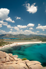 Sardinia, Villasimius. Panoramic view of Porto Giunco beach with turquoise sea water. Porto Giunco...