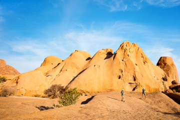 Fototapeta na wymiar Kids hiking in Spitzkoppe Namibia