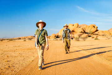 Family hiking in Spitzkoppe Namibia