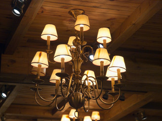 Fototapeta na wymiar Romantic diner under an old rustic chandelier