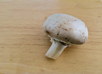 fresh mushroom on a chopping board