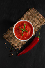 Traditional Maghrebi hot chili pepper sauce paste harissa. Tunisia and Arabic cuisine adjika