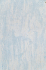 pale blue color on a metallic surface