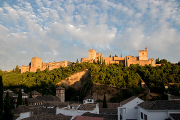 Naklejka premium A scenic view of the Alhambra in Granada, Spain. The complex was a Moorish palace until conquered by Isabel and Ferdinand during the Reconquista.