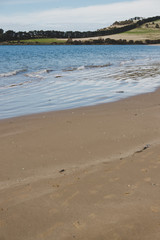sunny Australian beach in Cremorne, Tasmania