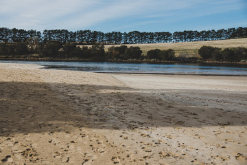 sunny Australian beach in Cremorne, Tasmania