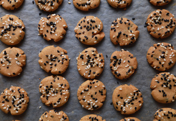 Sesame cookies on baking tray