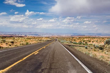 Gordijnen The road in Arizona, a road trip to the United States. © Yuliya Kirayonak