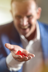 Take it! Cropped shot of a hand & rolling dices