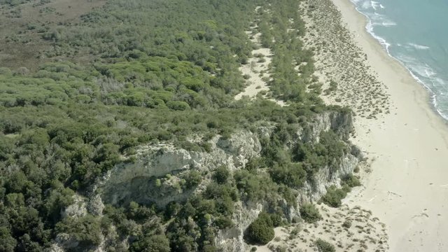 Mediterranean maquis shrubland on unspoilt sea beach