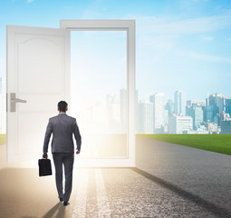 Fototapeta premium Businessman in front of door in business opportunities concept