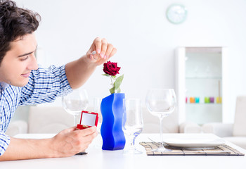 Man alone preparing for romantic date with his sweetheart