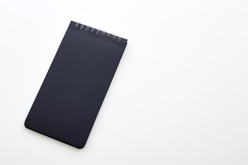 Blank notepad on white background