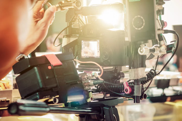 Behind the scene. cameraman shooting film scene with camera