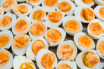 Peeled boiled egg ,Medium-boiled egg.Many eggs cooked to boil cooked to put together as food.
