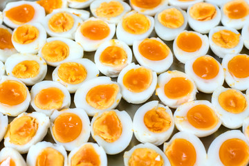 Peeled boiled egg ,Medium-boiled egg.Many eggs cooked to boil cooked to put together as food.