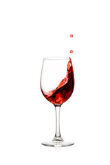 splash of red wine in glass isolated on white background.