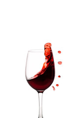 splash of red wine in glass isolated on white background.