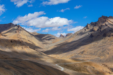 Fototapeta na wymiar Himalayan mountain landscape along Leh to Manali highway. Winding road and rocky mountains in Indian Himalayas, India