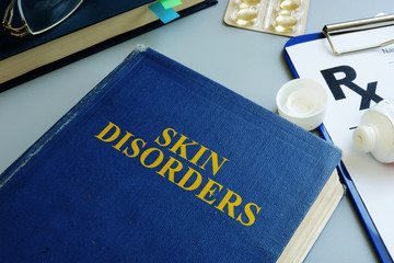 Skin disorders and prescription form in a clinic.