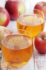 Two glasses with apple juice