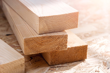 Wooden beam on the table in sunlight