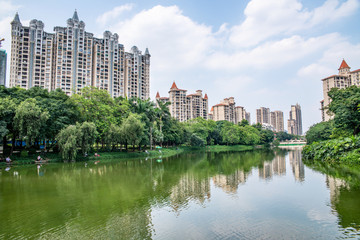 Fototapeta na wymiar Real estate real estate on the lakeside of Foshan Asian Art Park, Guangdong, China