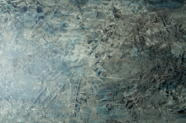 THE TEXTURE OF THE EMBOSSED SURFACE. UNEVEN BLANK BACKGROUND.