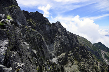 Fototapeta na wymiar Takitani; mt.Hotaka, Japan alps: Rock walls very popular for rock climbing in Japan; Takitani can be seen during trekking between Mt. Yarigatake and Mt. Hotakadake.