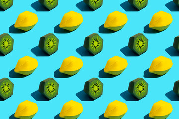 Colorful background of paper lemon and kiwi