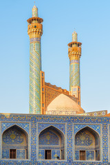 Obraz premium Minarets covered with colorful mosaic tiles, the Shah Mosque