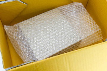 Bubbles covering the box by bubble wrap for protection product