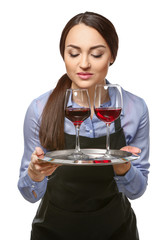 Portrait of elegant female sommelier on white background