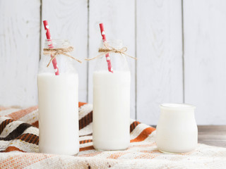 Bottles of milk and yogurt