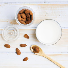 Glass of milk with almonds
