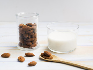 Glass of milk with almonds