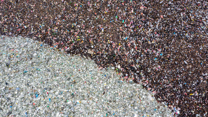 Aerial view glass bottles at the garbage dump, Recycling glass bottles.