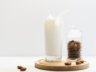 Glass of milk with almonds