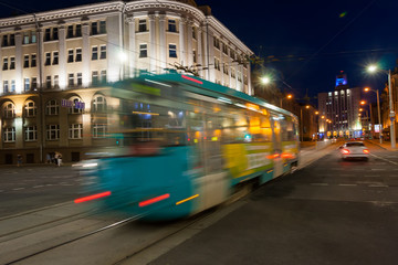 Plakat The motion of a blurred tram in the evening.
