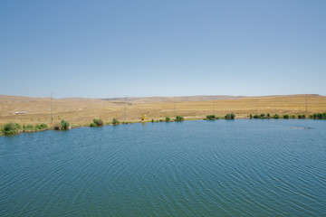 Landscape of an mountain lake in front of mountain range. Glorious lake landscape. The collaboration of blue and green. Multiple colors and amazing lake scenery. View of Abant Lake Golu .