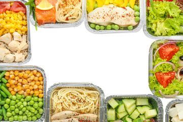 Containers with delicious food isolated on white