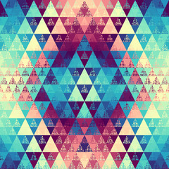 Seamless pattern of a triangles.. Aztec ornament. Vector image.