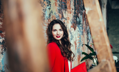 beautiful young woman with red lips in business style