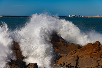 Fototapeta na wymiar Splashing Atlantic ocean wave at Portugal coast.