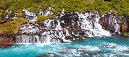 Barnafoss and Hraunfossars waterfall in Iceland	
