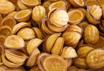 Background from the traditional dessert nuts with condensed milk, copy space